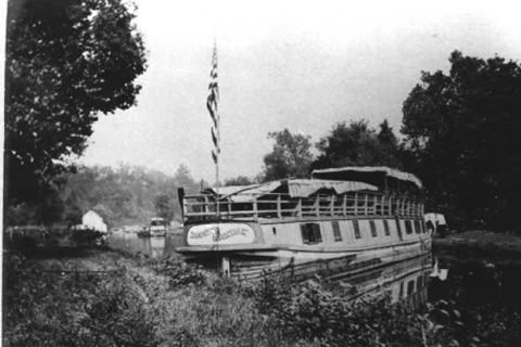 A packet boat stops near Big Blackwater to feed its mules (circa 1880-1910)